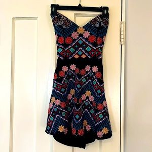 Indinka embroidered skort dress with open tie back
